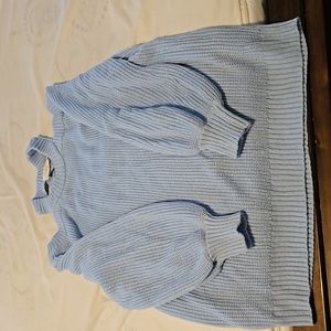 Sweater is a medium but fits like a large
